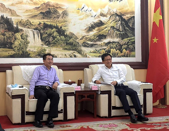 EV扑克总裁乔德卫造访朔州市长熊燕斌